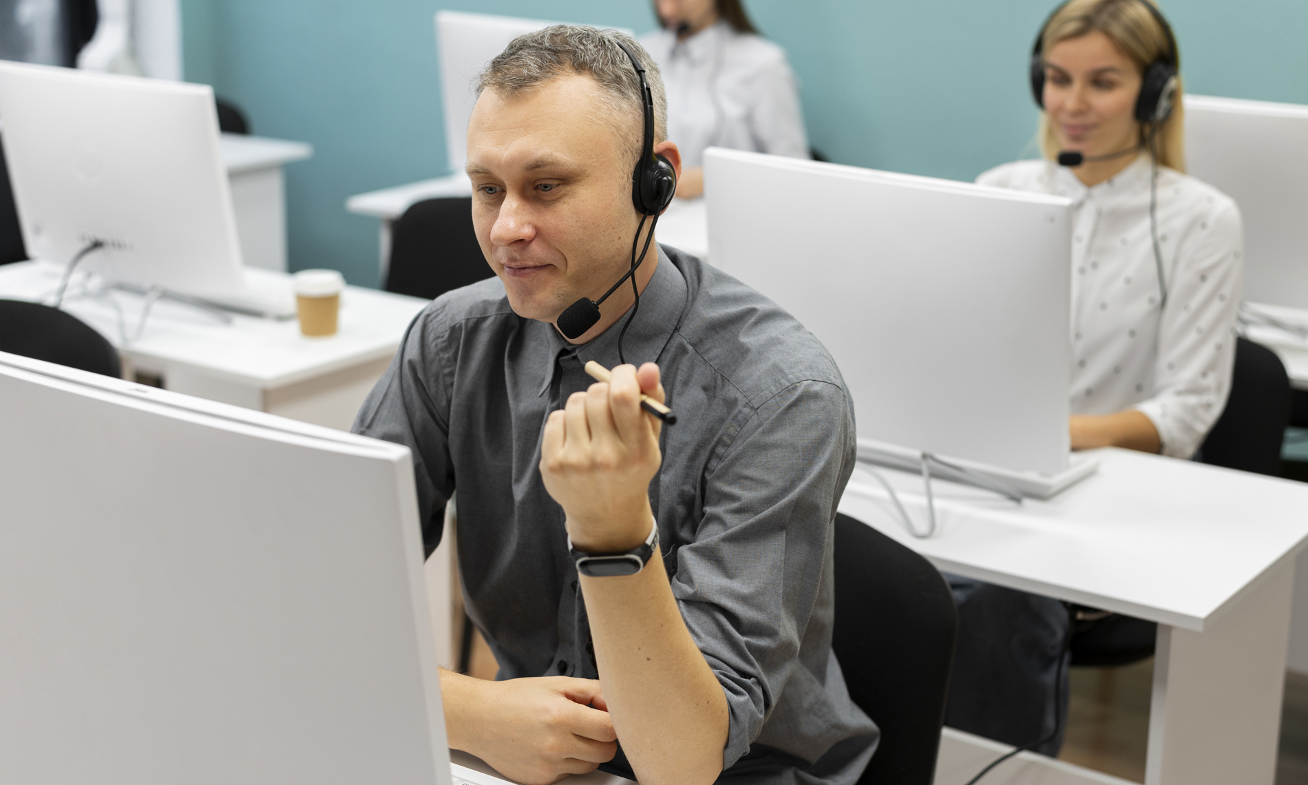 Group of employees working in a call center